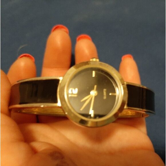 Black and silver hinged bangle watch